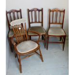 Three Edwardian inlaid chairs and an Edwardian elbow chair, all upholstered the same,