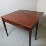 A flame mahogany 19th century turnover tea table with square tapering legs est: £50-£80