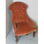 A Victorian pink upholstered buttoned back ladies chair in good condition,