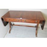 A 20th century period style mahogany sofa table with 2 frieze drawers over splayed end legs with