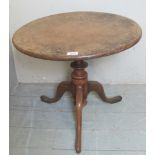A 19th century pale mahogany tripod table with turned column and triple splayed legs,