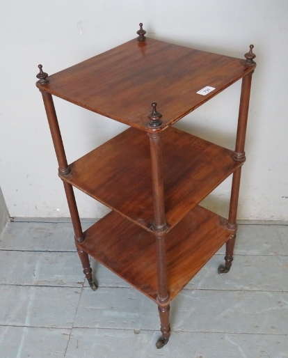 An Edwardian mahogany small three tier whatnot,