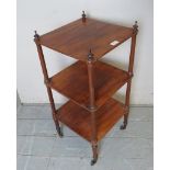 An Edwardian mahogany small three tier whatnot,