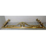 A 19th century very ornate brass fire fender in good condition,