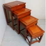 A 20th century Chinese nest of four, possibly Huanghuali wood tables,