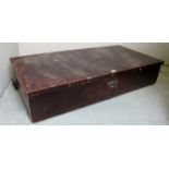 A pull out blanket box on wheels with lift up lid and brass centre handle,