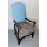 An early 20th century Dutch design, high back elbow chair, upholstered in pale blue,