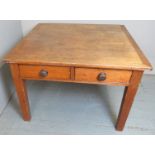 A late 19th/20th century pine square kitchen table with two drawers each side est: £50-£80