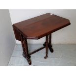 An Edwardian mahogany small Sutherland table with turned legs and stretcher est: £30-£40
