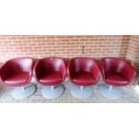 A set of 4 20th century Boss Design group red swivel tub chairs on chrome supports,