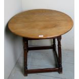 C1900 Oak circular lamp table with turned legs and stretcher,