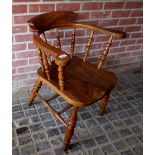 A 19th Century elm seated captain's chair with turned spindles to back est: £30-£50