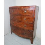 A 19th century mahogany bow front chest of two short over three long drawers,