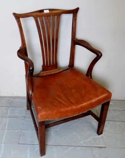 A Georgian tan leather elbow library desk chair,