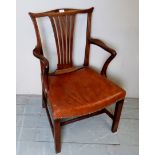 A Georgian tan leather elbow library desk chair,