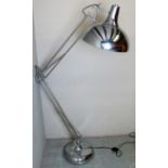 A large floor standing chrome angle-poise lamp in good condition est: £50-£100