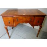 An early 20th century pale walnut small desk, bearing label for Franklin Homan Rochester,