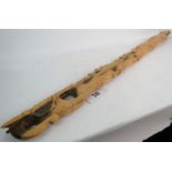 A Balinese carved hardwood staff, featur