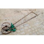 A small hand garden plough, est: £30-£40