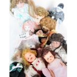 A collection of vintage and modern dolls