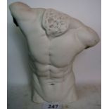 A contemporary simulated marble torso i