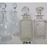 Four good quality cut glass decanters an