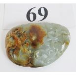 A jade stone carved with chilong and lil