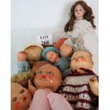 A collection of antique and vintage doll