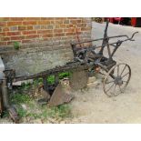 A large antique iron farming plough, est