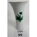 A continental porcelain vase with handpa