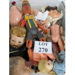 A collection of dolls, doll parts, puppe