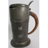 A Liberty & Co Arts & Crafte 'Tudric' pewter tankard in the manner of Archibald Knox, hinged lid,