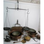 A quantity of antique brass and copper cookware to include kettle, pans, balance scales,