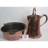 A large copper jug, 34cm tall to rim, and a large copper hanging pot with iron handle,