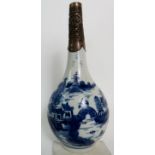 An antique Chinese blue and white porcelain bottle vase, probably 17th/18th century,