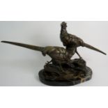 A bronze statue of two pheasants signed Mauper Luis on a marble base,