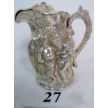 A silver plated jug with hinged lid,