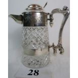 A good quality cut glass and silver plated mounted claret jug, with hinged doomed lid,