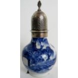 An antique Chinese blue and white porcelain vase with white metal cover, probably Kangxi,