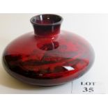 A Royal Doulton Flambe vase of impressive size with a rural scene rendered in red tones,