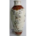 A Japanese Meiji period ceramic vase decorated with floral enamels and gilt borders, 46cm tall,