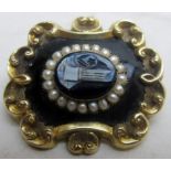 A mourning brooch set with seed pearls a