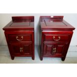 A pair Chinese bedside cupboards with a