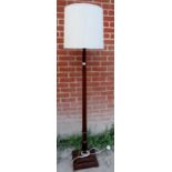 A 19th century mahogany standard lamp wi