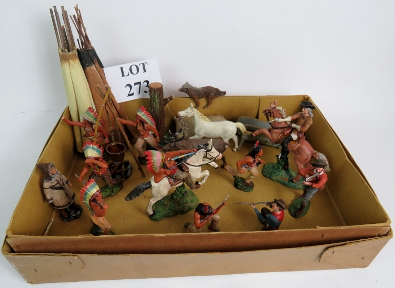 A collection of vintage toy Cowboys and