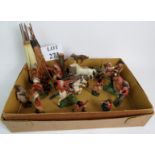 A collection of vintage toy Cowboys and