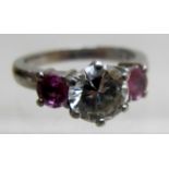 A platinum ring set with centre diamond,