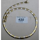 A 9ct white and yellow gold link type ne