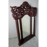 An ornate Cambodian carved wall mirror d