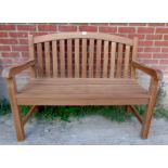 A 20th century teak slatted garden bench